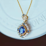 SAPPHIRE HALO GOLD NECKLACE