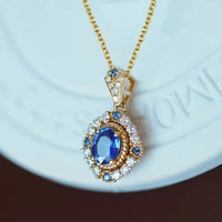 SAPPHIRE HALO GOLD NECKLACE