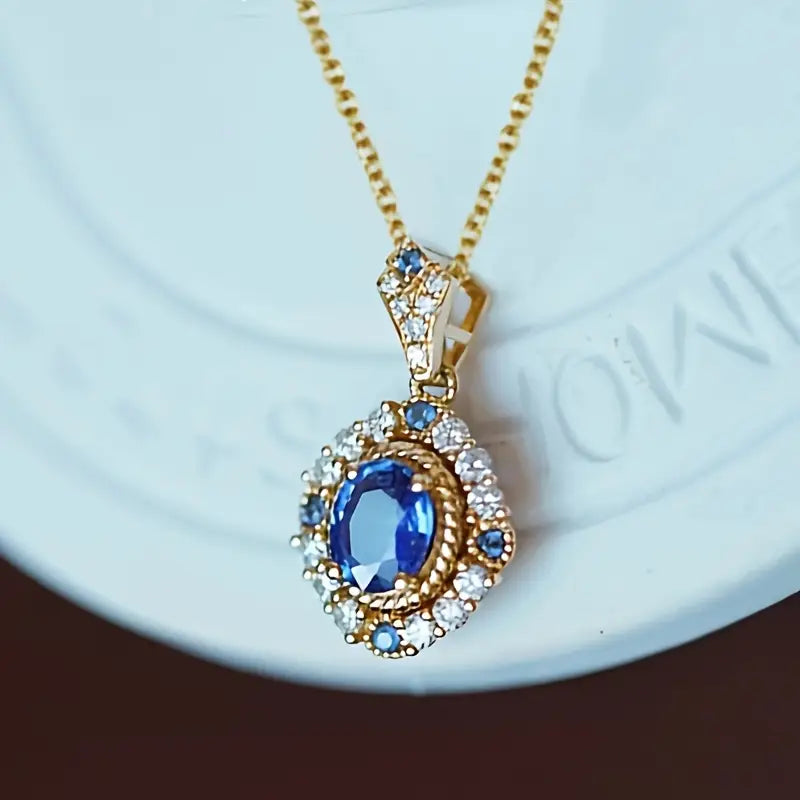 SAPPHIRE HALO GOLD NECKLACE
