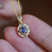 SAPPHIRE HALO GOLD NECKLACE