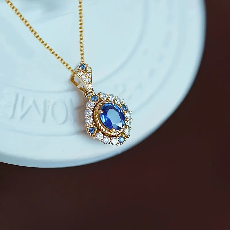 SAPPHIRE HALO GOLD NECKLACE