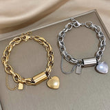 ELEGANT GOLD-PLATED HEART CHARM BRACELET