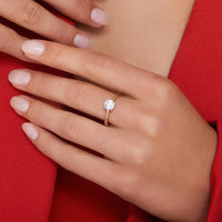 ELEGANT GOLD-PLATED SOLITAIRE RING