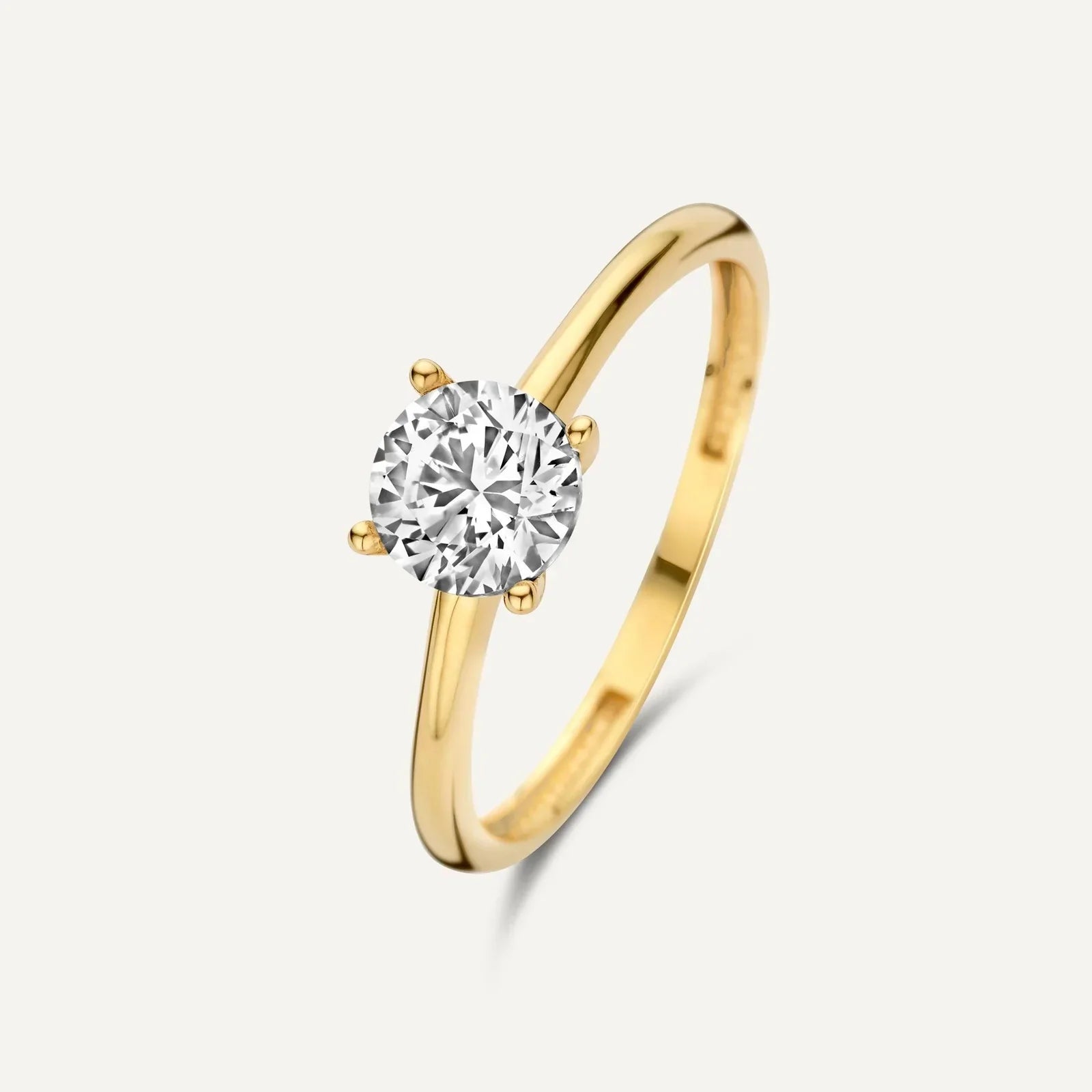ELEGANT GOLD-PLATED SOLITAIRE RING